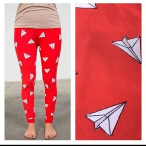 Lularoe unicorn paper airplane leggings